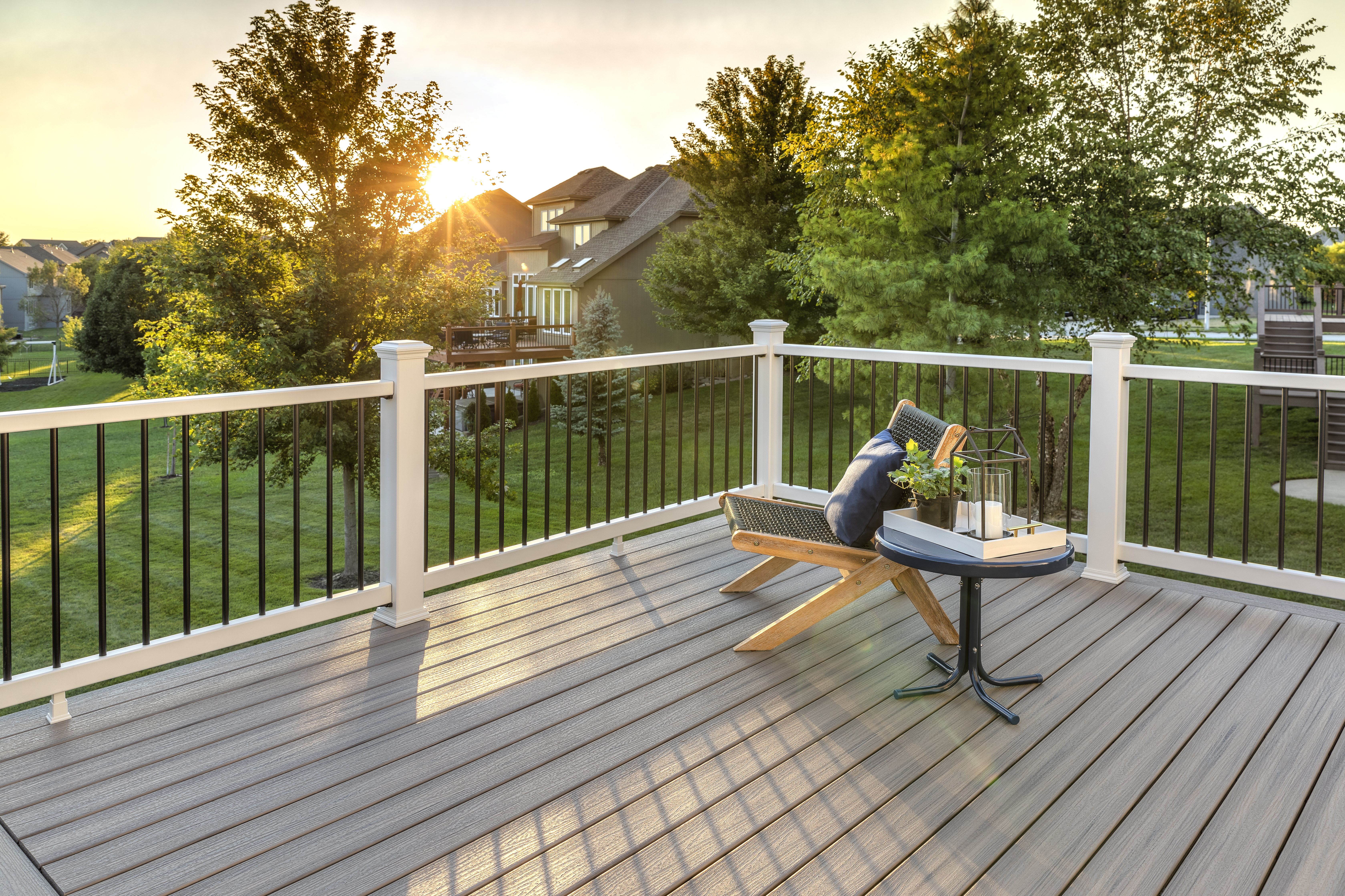 ENH_Missouri_002_RH_ENH_Railing_WT_looking_out_chair_table_sunset Thumbnail